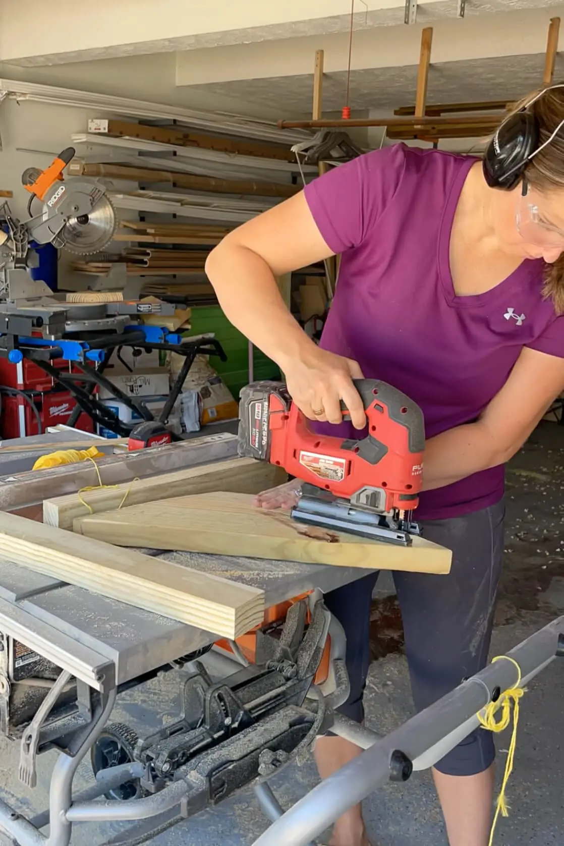 Using a jig saw to cut pieces for a wood corbel. 